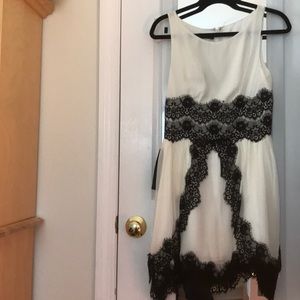 NEW WITH TAGS Off white Bebe dress with black lace